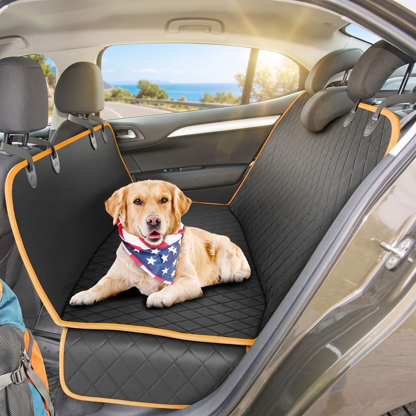 Dog sitting on waterproof hammock car seat cover